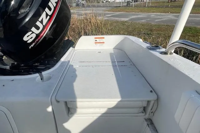 Slide: The Image of 2011 Triumph 190 Bay boat with Suzuki outboard motor, rear deck view. - 9