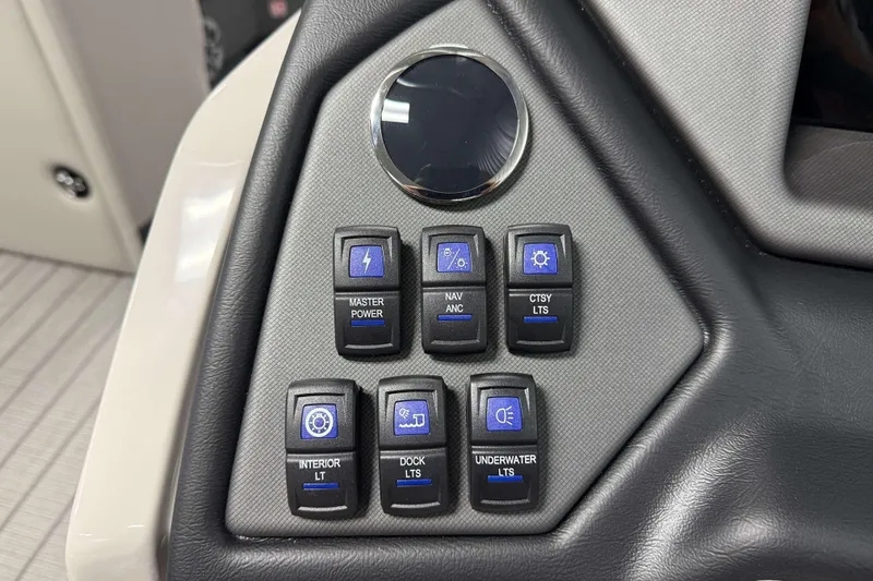 Slide: The Image of Control panel of 2026 Sylvan L3 CLZ DH boat with various function buttons. - 10