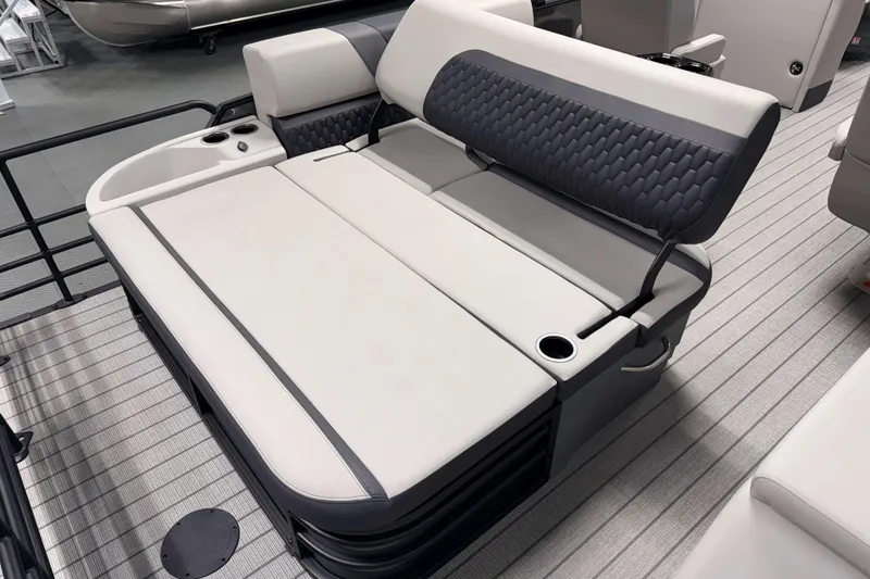 Slide: The Image of 2026 Sylvan L3 CLZ DH boat interior with luxurious seating and cup holders. - 16