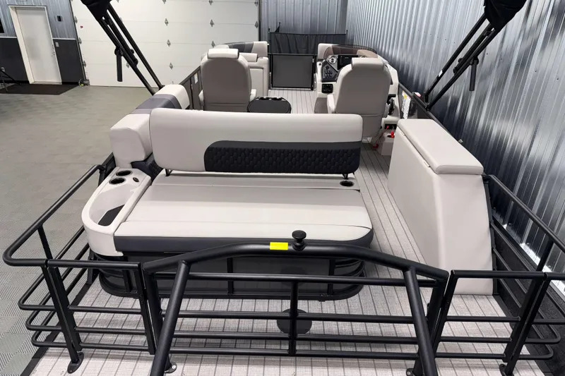 Slide: The Image of 2026 Sylvan L3 CLZ DH pontoon boat interior with modern seating and sleek design. - 17