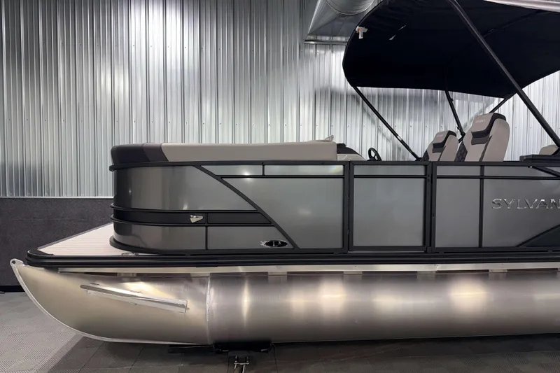 Slide: The Image of 2026 Sylvan L3 CLZ DH pontoon boat with sleek design and modern seating. - 22