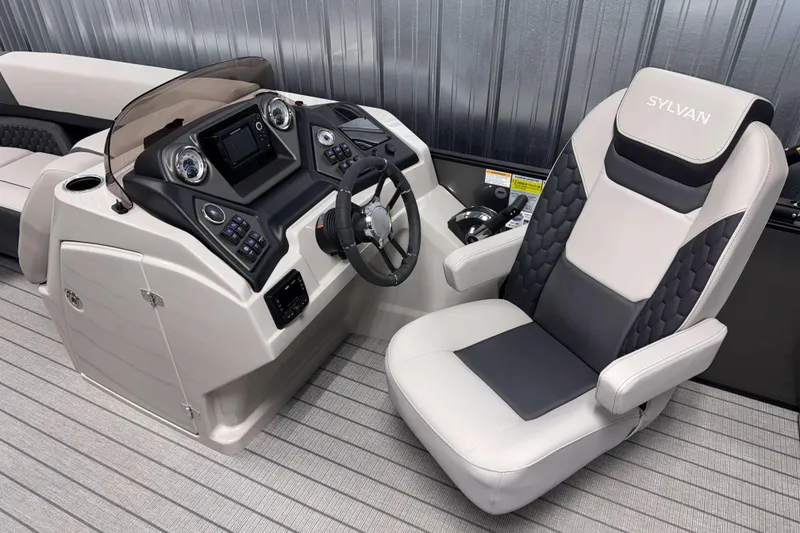 Slide: The Image of 2026 Sylvan L3 CLZ DH boat interior with modern dashboard and comfortable captain's chair. - 7