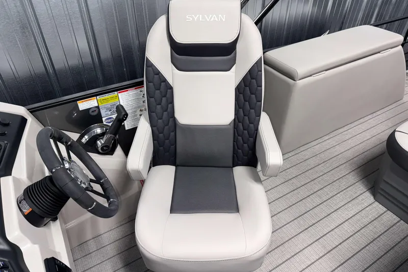Slide: The Image of 2026 Sylvan L3 CLZ DH boat interior with steering wheel and captain's chair. - 8