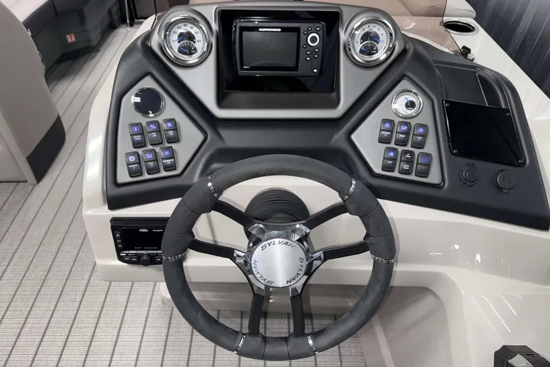 Slide: The Image of Steering console of 2026 Sylvan L3 CLZ DH boat with modern controls and display. - 9