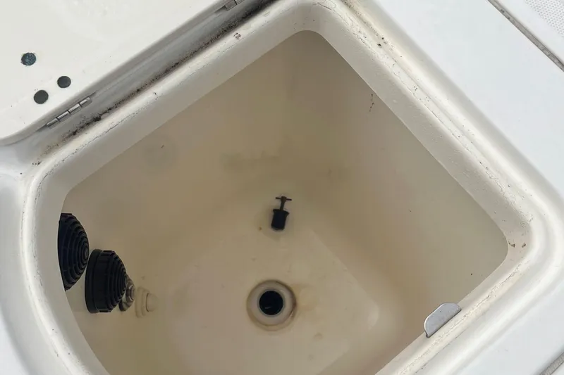 Slide: The Image of Livewell compartment in a 2006 Boston Whaler 240 Outrage boat. - 8