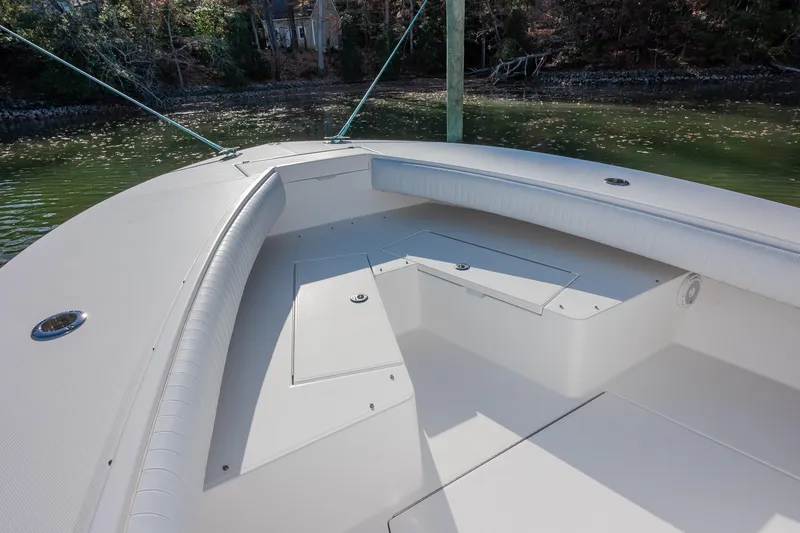 Slide: The Image of 2008 Regulator 32 Forward Seating boat interior with spacious seating and storage. - 26