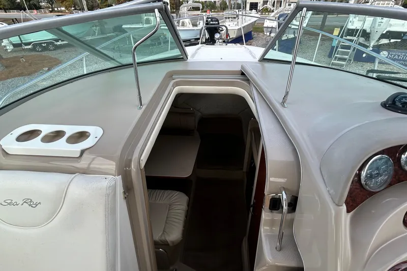 Slide: The Image of 2004 Sea Ray 280 Sundancer boat interior view with cabin entrance. - 19
