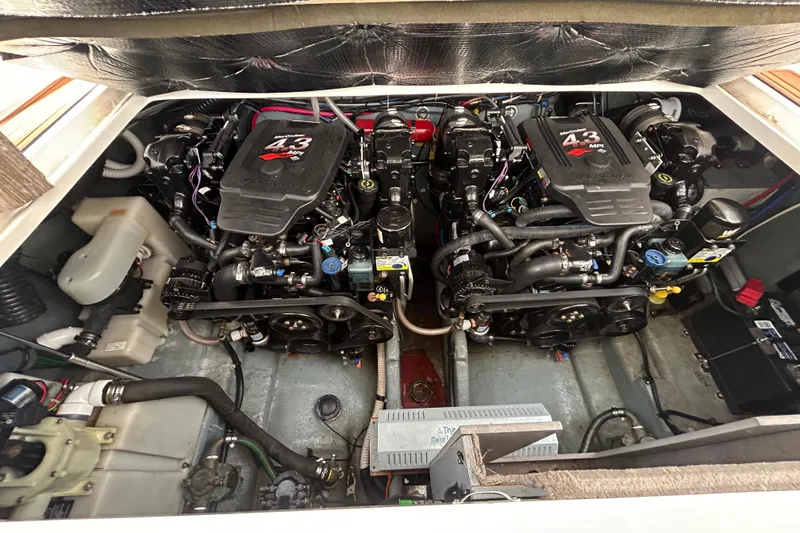 Slide: The Image of Engine compartment of 2004 Sea Ray 280 Sundancer with twin MerCruiser 4.3 MPI engines. - 35