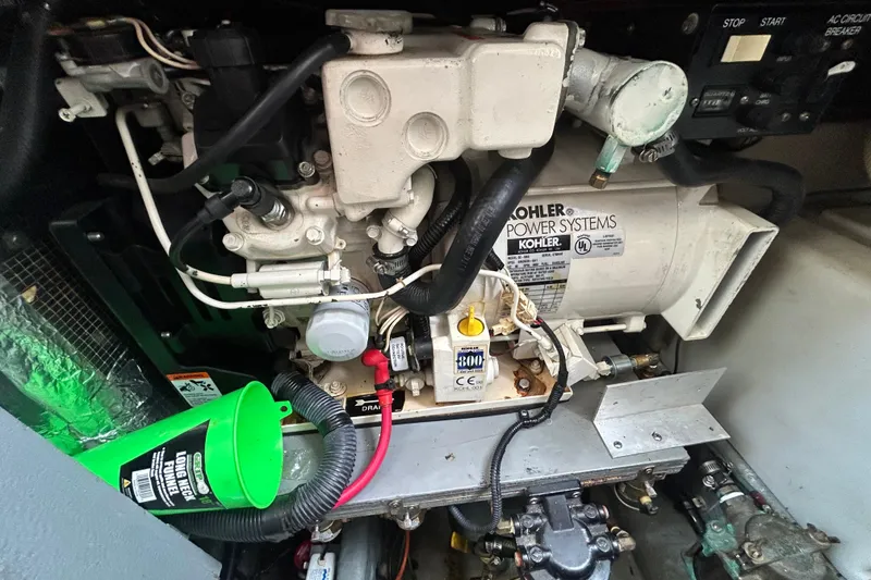 Slide: The Image of Engine compartment of a 2004 Sea Ray 280 Sundancer with Kohler power system. - 39