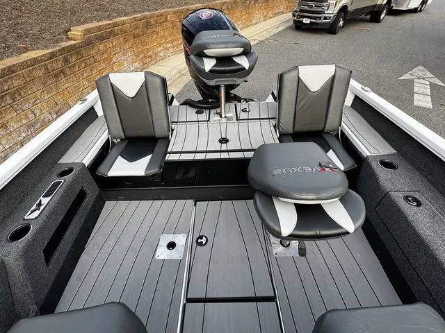Slide: The Image of 2024 Vexus ADX180 boat interior with sleek seating and modern design. - 13