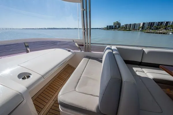 Slide: The Image of Luxurious interior of 2016 Princess Flybridge yacht overlooking the water. - 28