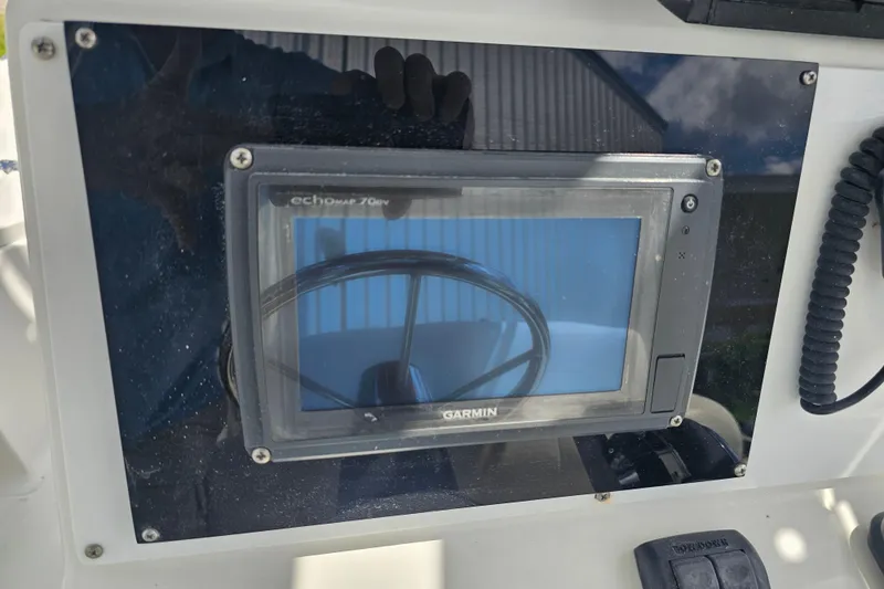 Slide: The Image of Garmin echomap 70dv on 2006 Triton 220 LTS boat dashboard. - 38