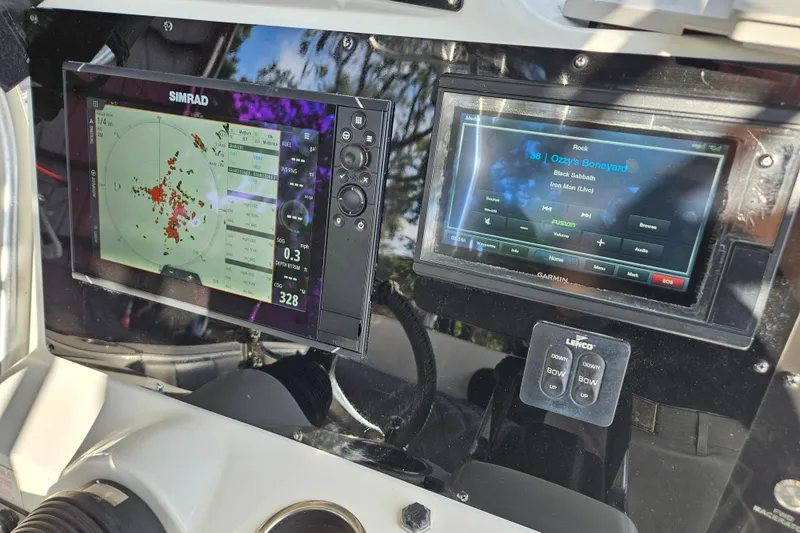 Slide: The Image of Center console of 2006 Polar 2700 with Simrad and Garmin displays. - 22