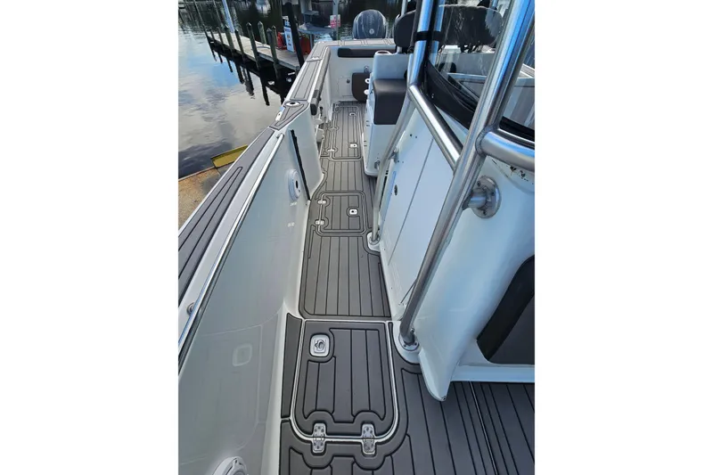 Slide: The Image of 2006 Polar 2700 Center Console boat interior with sleek, modern design and durable flooring. - 30