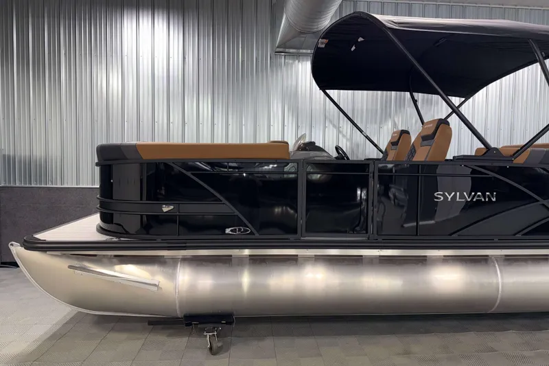 Slide: The Image of 2026 Sylvan L3 CLZ DH pontoon boat with sleek black design and canopy. - 24