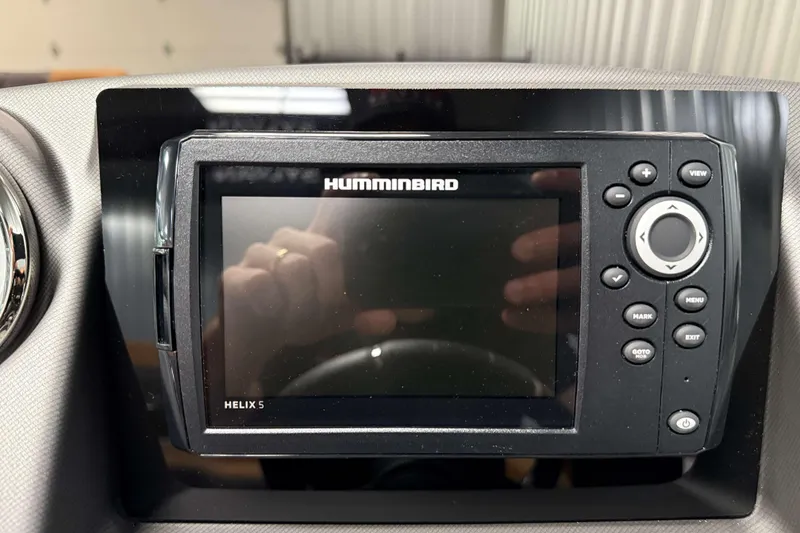 Slide: The Image of Humminbird Helix 5 fish finder on 2026 Sylvan L3 CLZ DH dashboard. - 12