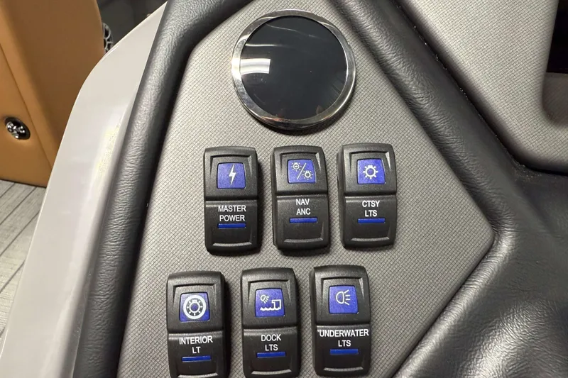 Slide: The Image of Control panel of 2026 Sylvan L3 CLZ DH with various labeled switches. - 14