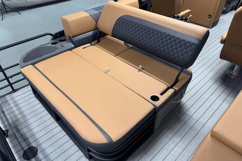 Slide: The Image of Luxurious seating on 2026 Sylvan L3 CLZ DH boat with tan and gray upholstery. - 19