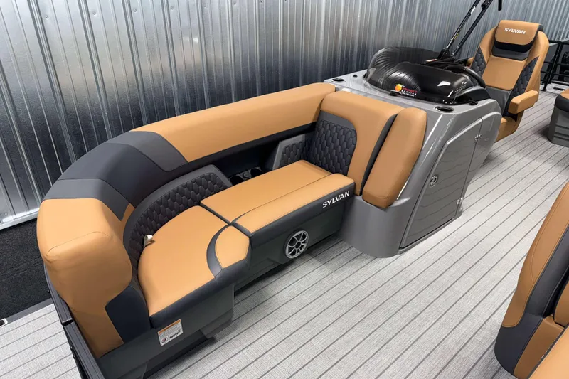 Slide: The Image of Luxurious 2026 Sylvan L3 CLZ DH boat interior with tan and gray seating. - 2