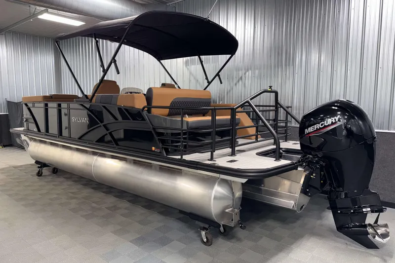 Slide: The Image of 2026 Sylvan L3 CLZ DH pontoon boat with Mercury outboard in a showroom. - 28