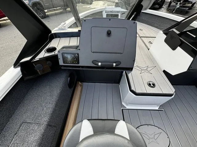 Slide: The Image of 2024 Vexus ADX190 boat interior with sleek dashboard and modern seating. - 8