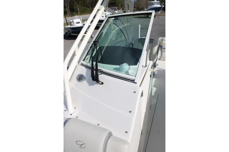 Slide: The Image of 2026 Sailfish 245 DC boat windshield and cockpit view. - 25