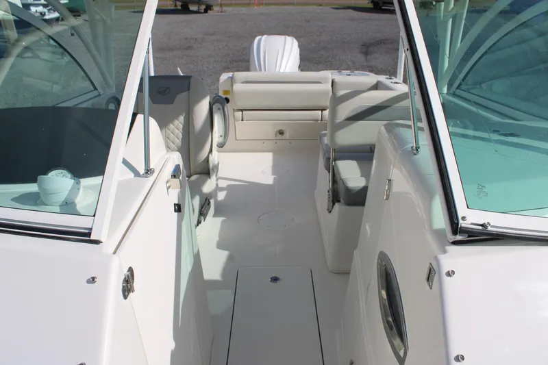 Slide: The Image of 2026 Sailfish 245 DC boat interior with seating and windshield, showcasing modern design. - 26
