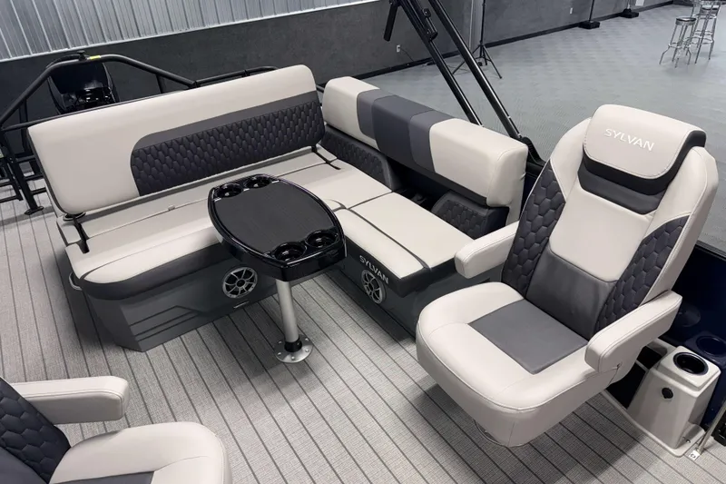 Slide: The Image of Luxurious 2026 Sylvan L3 CLZ DH boat interior with plush seating and sleek design. - 14