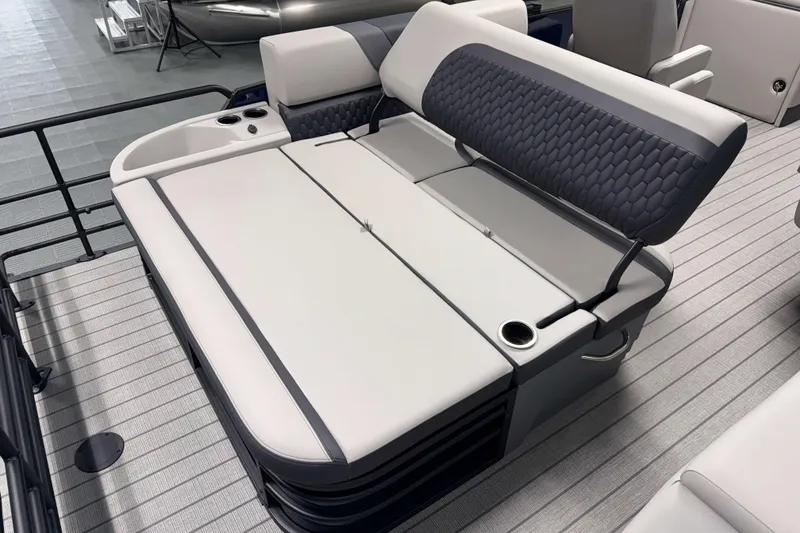 Slide: The Image of Luxurious seating on 2026 Sylvan L3 CLZ DH pontoon boat with cup holders. - 16