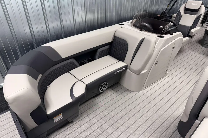 Slide: The Image of Luxurious 2026 Sylvan L3 CLZ DH boat interior with plush seating and modern design. - 2