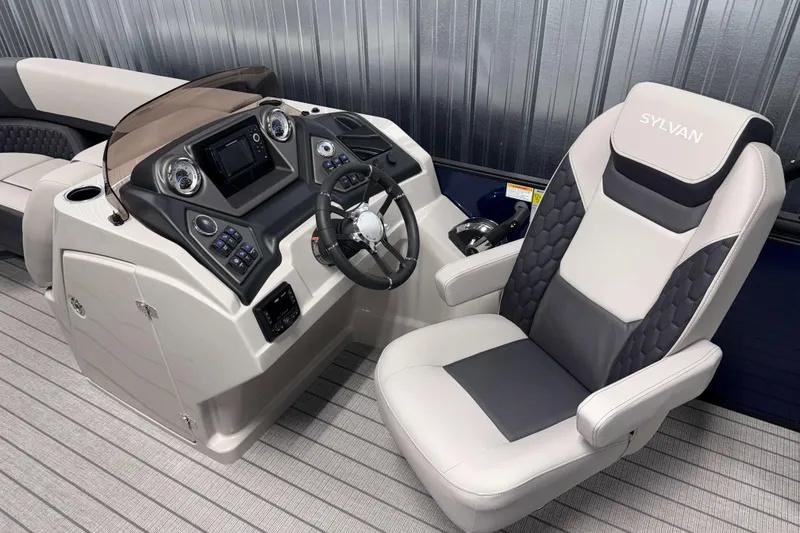Slide: The Image of 2026 Sylvan L3 CLZ DH boat interior with modern helm and comfortable captain's chair. - 9
