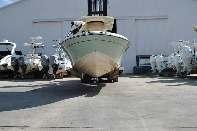 Slide: The Image of 2021 Grady-White 251 Coastal Explorer boat on dock with Yamaha 300 engine. - 21