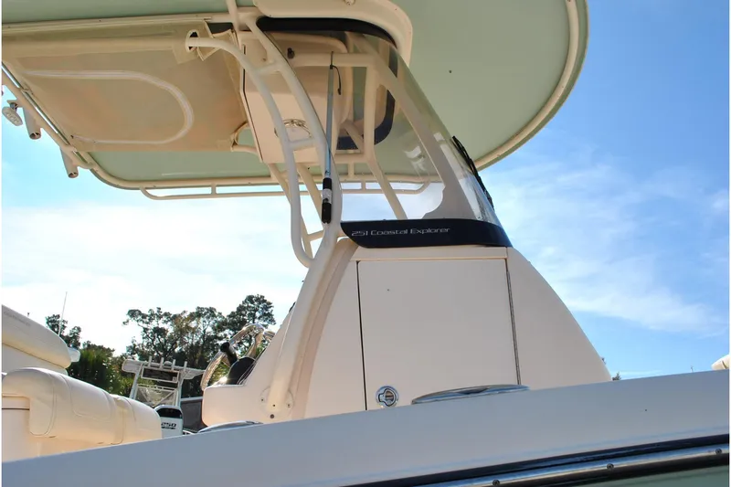 Slide: The Image of 2021 Grady-White 251 Coastal Explorer boat, rear view with branding details. - 25