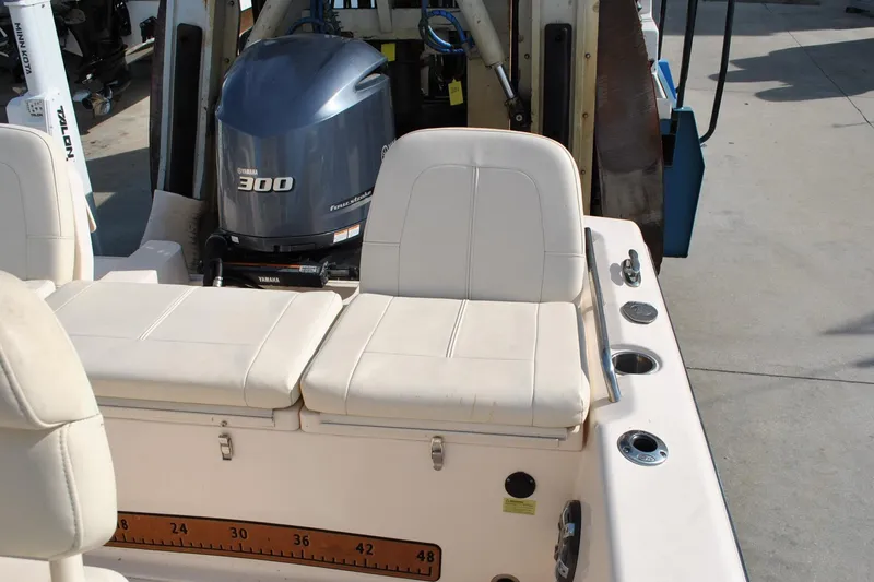 Slide: The Image of 2021 Grady-White 251 Coastal Explorer boat console with Fusion stereo and cup holders. - 38