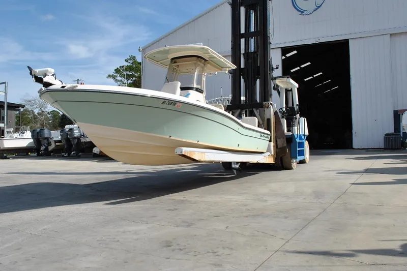 Slide: The Image of 2021 Grady-White 251 Coastal Explorer boat docked in a marina. - 52
