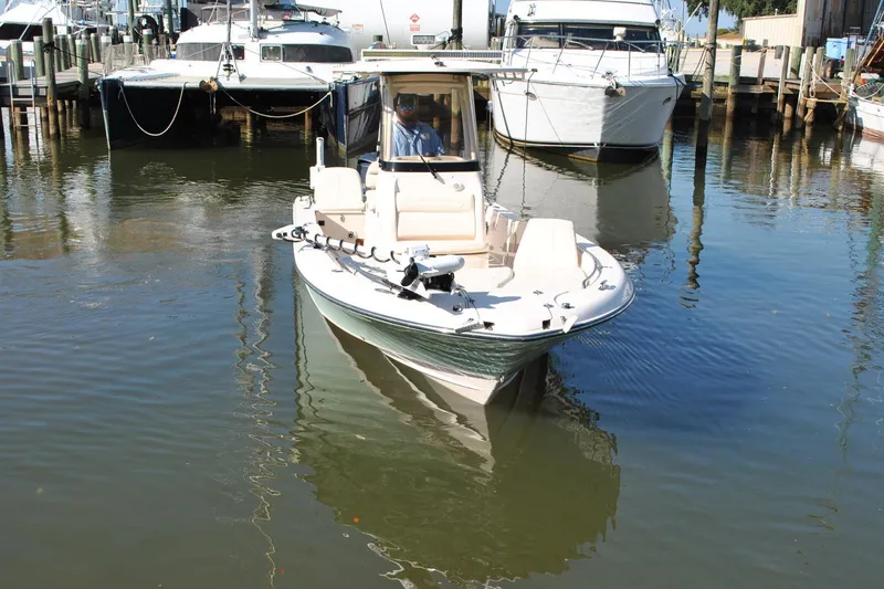 Slide: The Image of 2021 Grady-White 251 Coastal Explorer boat docked in marina. - 57