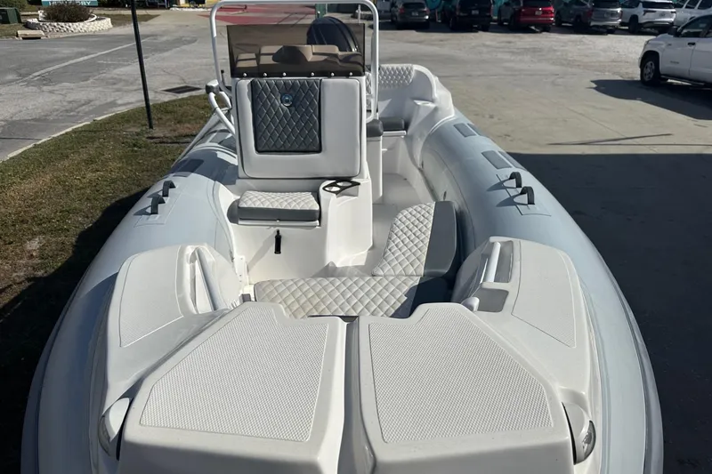 Slide: The Image of 2024 Caribe DL-20S inflatable boat with quilted seating and modern design. - 8