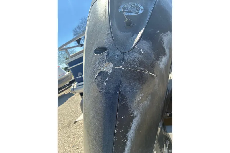 Slide: The Image of 2017 Sun Tracker Fishin' Barge 22 DLX with visible hull damage. - 15