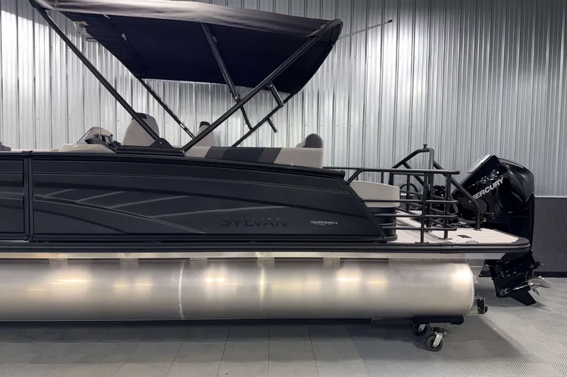 Slide: The Image of 2026 Sylvan L3 CLZ DH Platinum pontoon boat with canopy and Mercury outboard motor. - 25