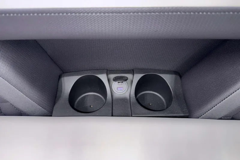 Slide: The Image of 2026 Sylvan L3 CLZ DH Platinum cup holders and power outlet detail. - 4