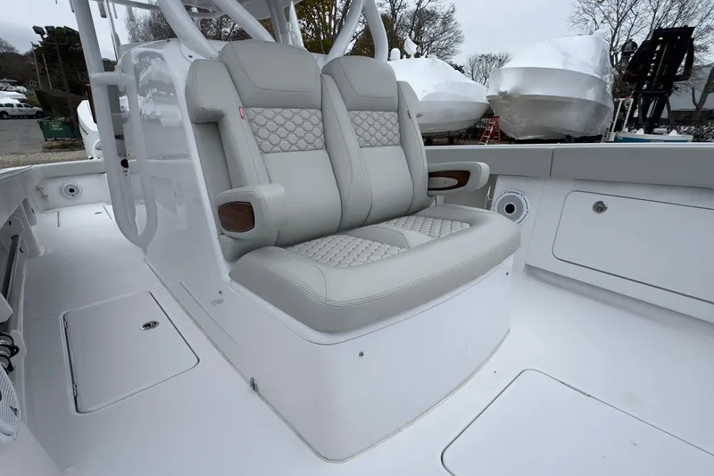 Slide: The Image of 2024 Jupiter 32 FS boat interior with luxurious seating and modern design. - 40