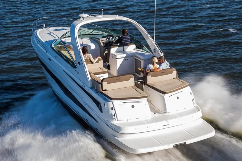 Slide: The Image of Manufacturer Provided Image: 2015 Sea Ray 370 Venture cruising on water with passengers. - 2