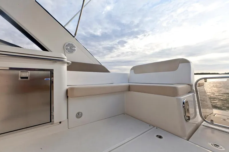 Slide: The Image of Manufacturer Provided Image: 2015 Sea Ray 370 Venture boat deck with seating and storage. - 4