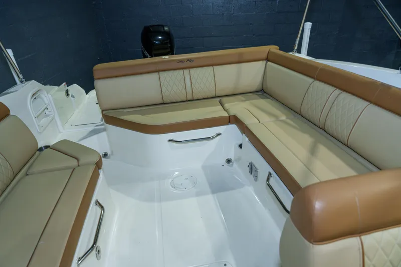 Slide: The Image of Luxurious seating area on a 2015 Sea Ray 270 Sundeck boat. - 30