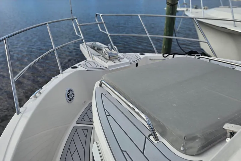 Slide: The Image of Bow view of 2026 Solara S-310 SB boat with sleek deck design. - 14