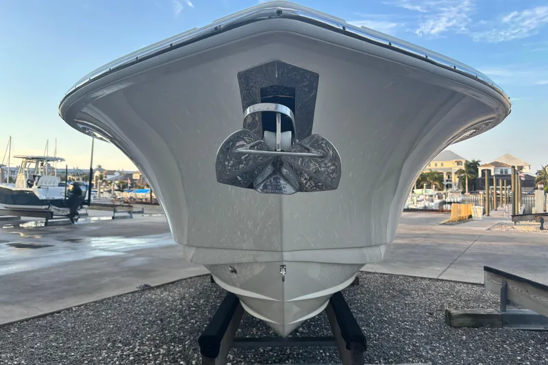 Slide: The Image of 2017 Scout 255 Dorado boat front view at marina. - 6