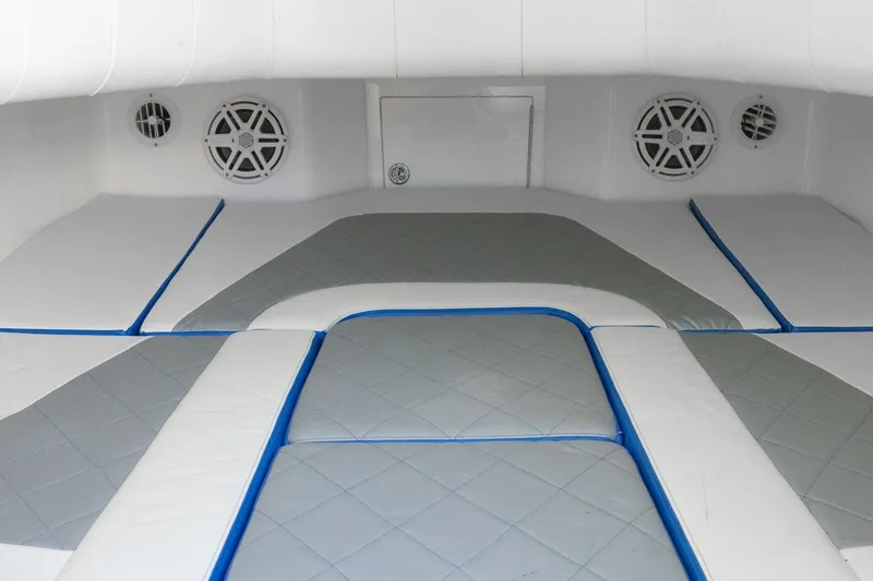 Slide: The Image of Interior cabin of 2019 Deep Impact 399 Sport boat with cushioned seating. - 16