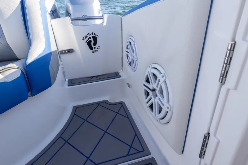 Slide: The Image of Interior of 2019 Deep Impact 399 Sport boat with speakers and seating. - 37