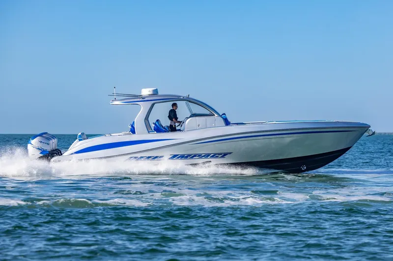 Slide: The Image of 2019 Deep Impact 399 Sport boat cruising on open water. - 39