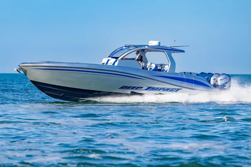 Slide: The Image of 2019 Deep Impact 399 Sport boat cruising on open water. - 43